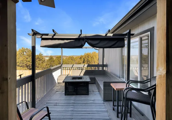 a view of balcony with chairs