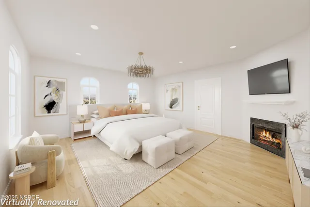 a view of a bedroom from a hallway