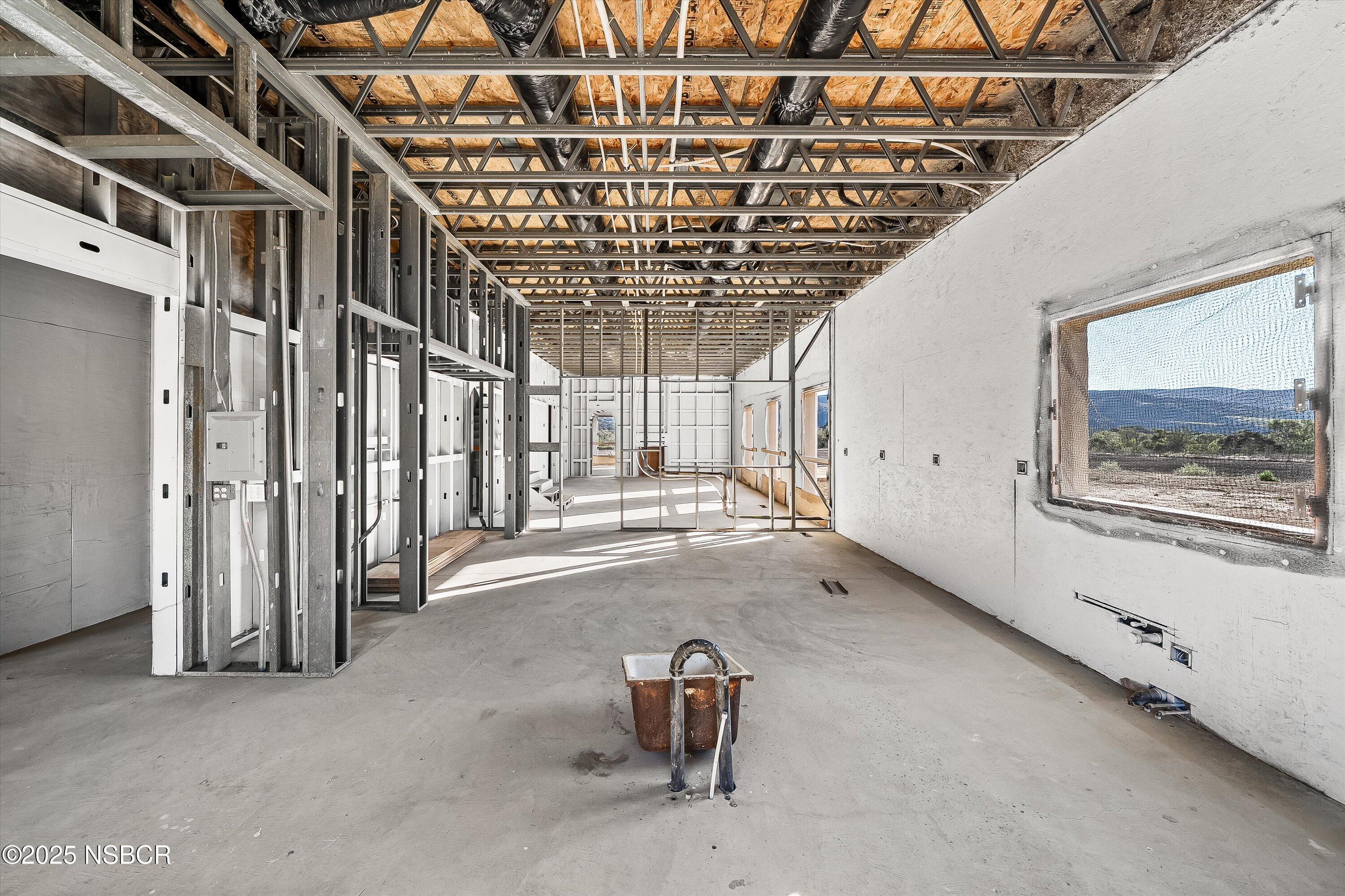 4375 Sweeney Road Lompoc, CA 93436 - Photo 24 of 74 a view of a hallway with wooden walls