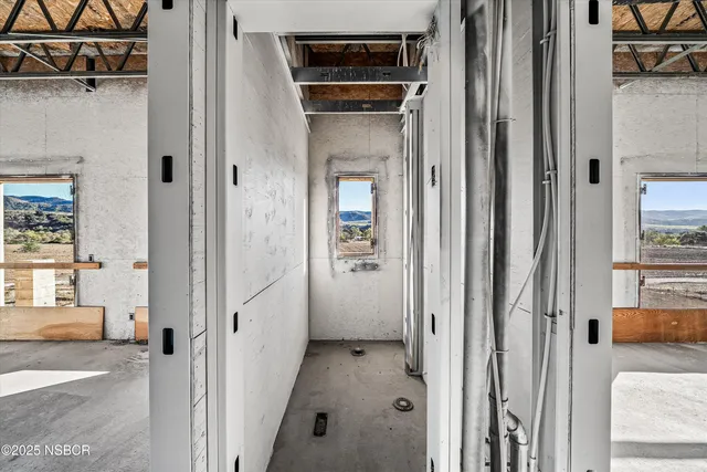 a bathroom with a tub and shower
