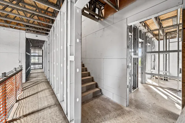 a view of a livingroom with furniture