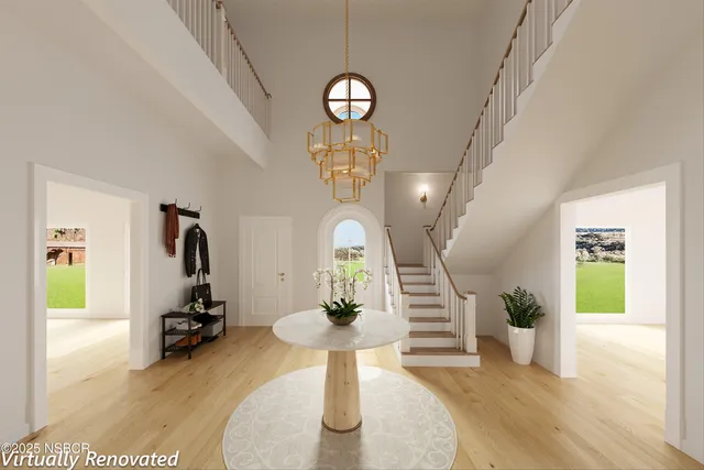 a living room with fireplace furniture and a wooden floor