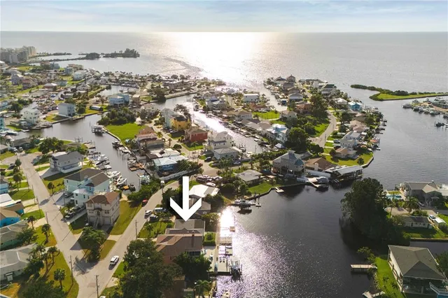 an aerial view of residential building with parking space