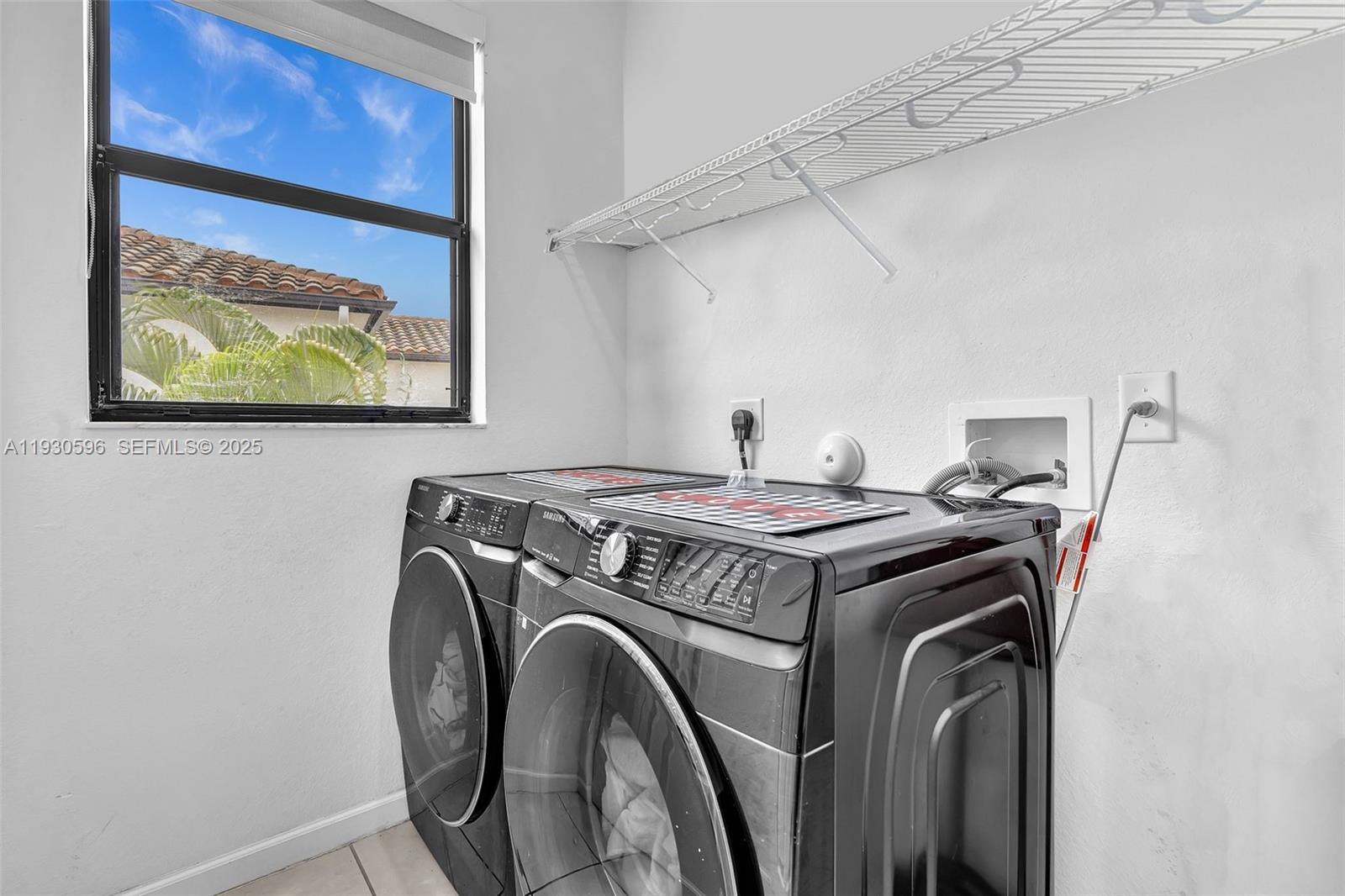 11709 Southwest 253rd Street Homestead, FL 33032 - Photo 34 of 47 a utility room with dryer and washer