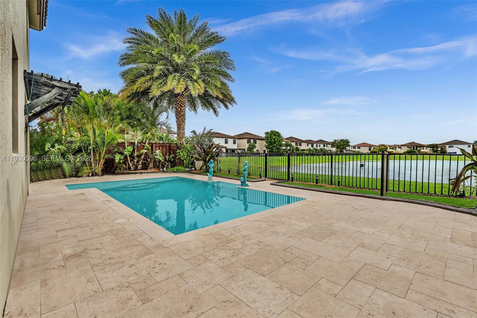 11709 Southwest 253rd Street Homestead, FL 33032 - Photo 37 of 47 a view of a garden with palm trees