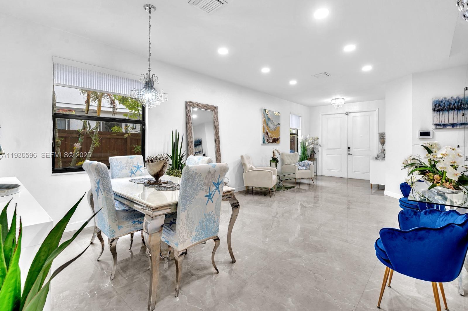 11709 Southwest 253rd Street Homestead, FL 33032 - Photo 8 of 47 a living room with furniture and a potted plant