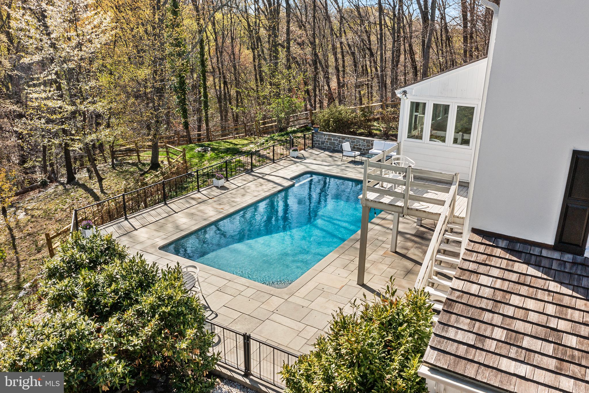 130 Colket Lane Devon, PA 19333 - Photo 33 of 34 a view of backyard with swimming pool and seating