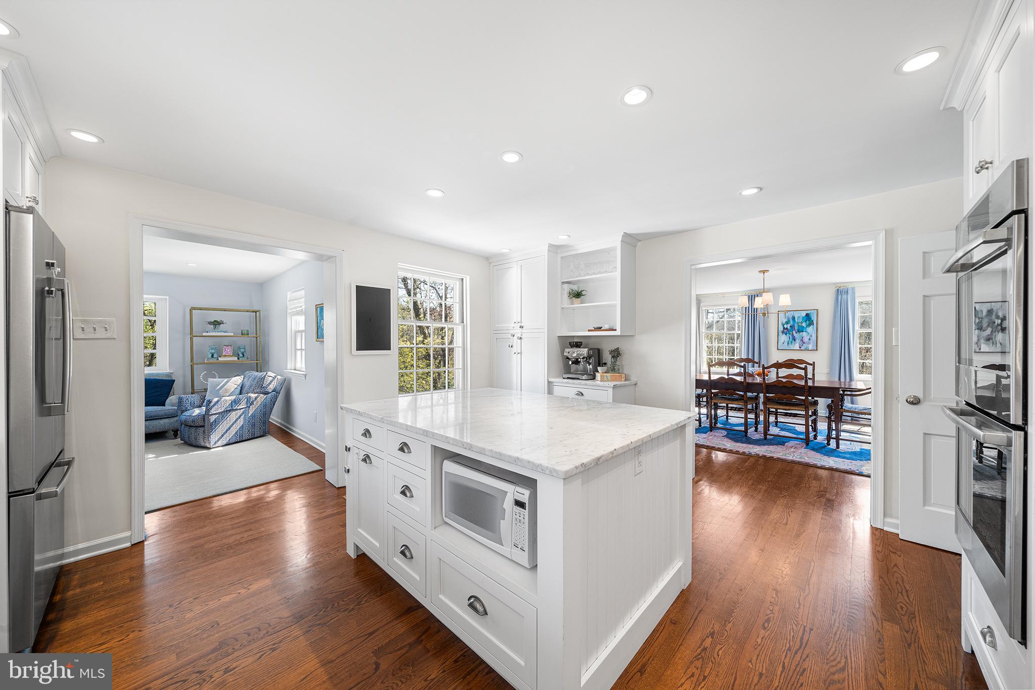 130 Colket Lane Devon, PA 19333 - Photo 9 of 34 a open kitchen with stainless steel appliances granite countertop a lot of counter top space and wooden floor