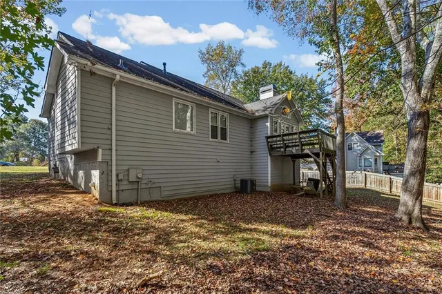 a view of a yard with trees