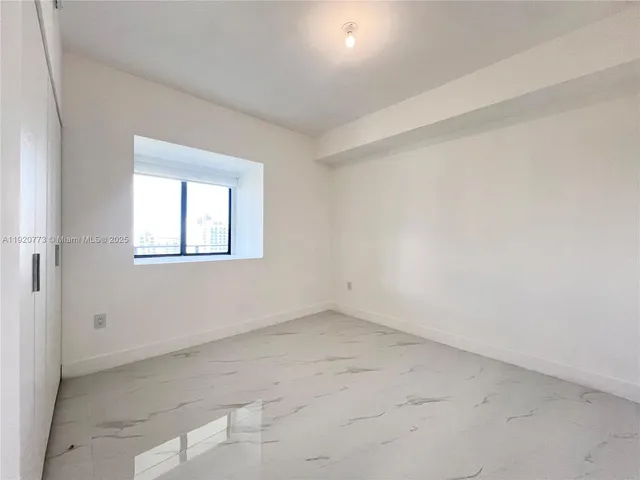 an empty room with a window