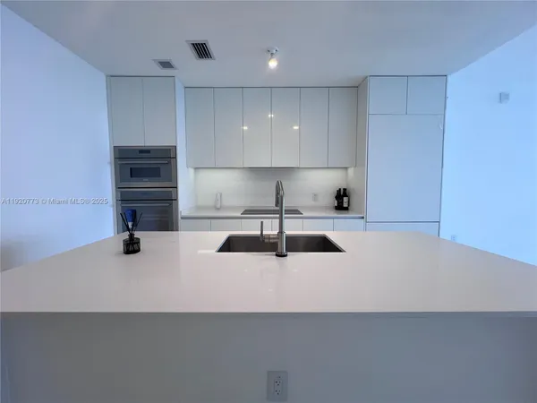 a view of an empty room with window