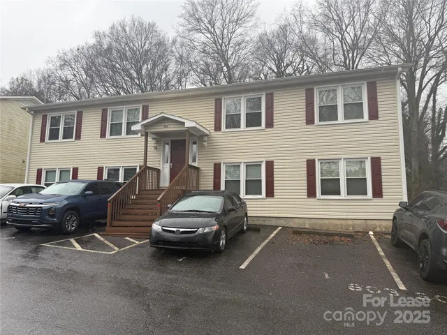 a car parked in front of a house