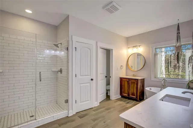 a view of a room with rack and wooden floor