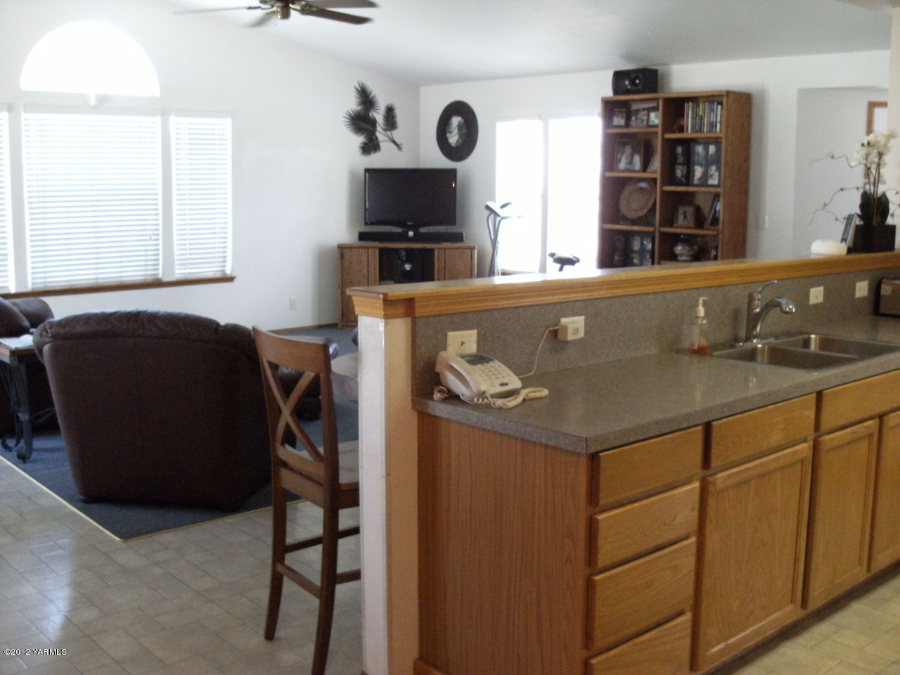 1628 Saul Road Sunnyside, WA 98944 - Photo 3 of 10 a view of kitchen with cabinets and window