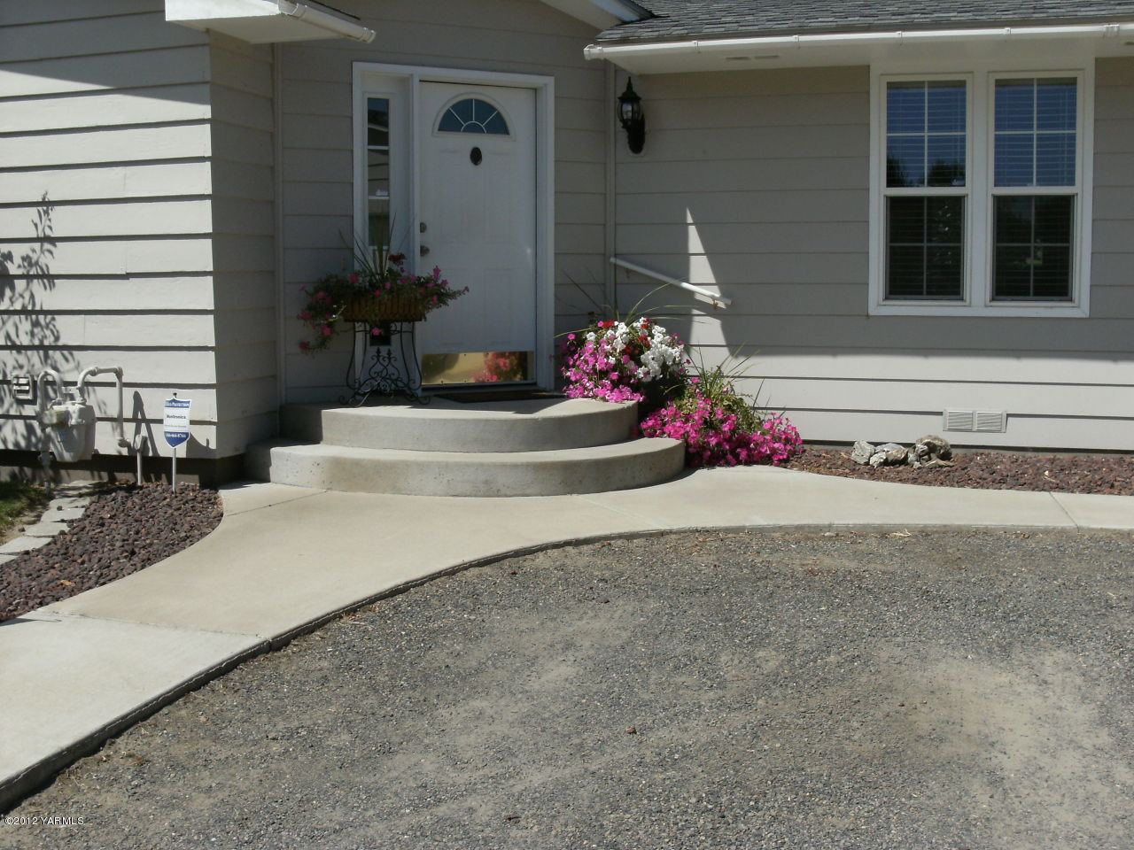 1628 Saul Road Sunnyside, WA 98944 - Photo 8 of 10 a view of a house with a garage