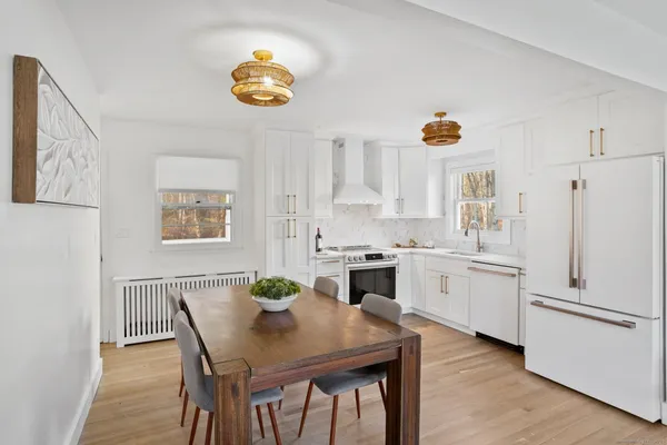 a room with a sink and cabinets