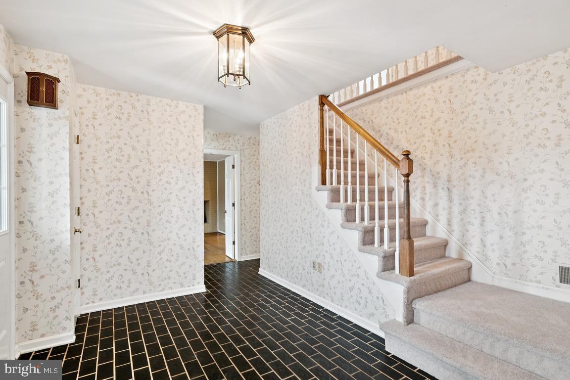 9033 Old Waterloo Road Warrenton, VA 20186 - Photo 4 of 48 Foyer to Upstairs
New Carpeting