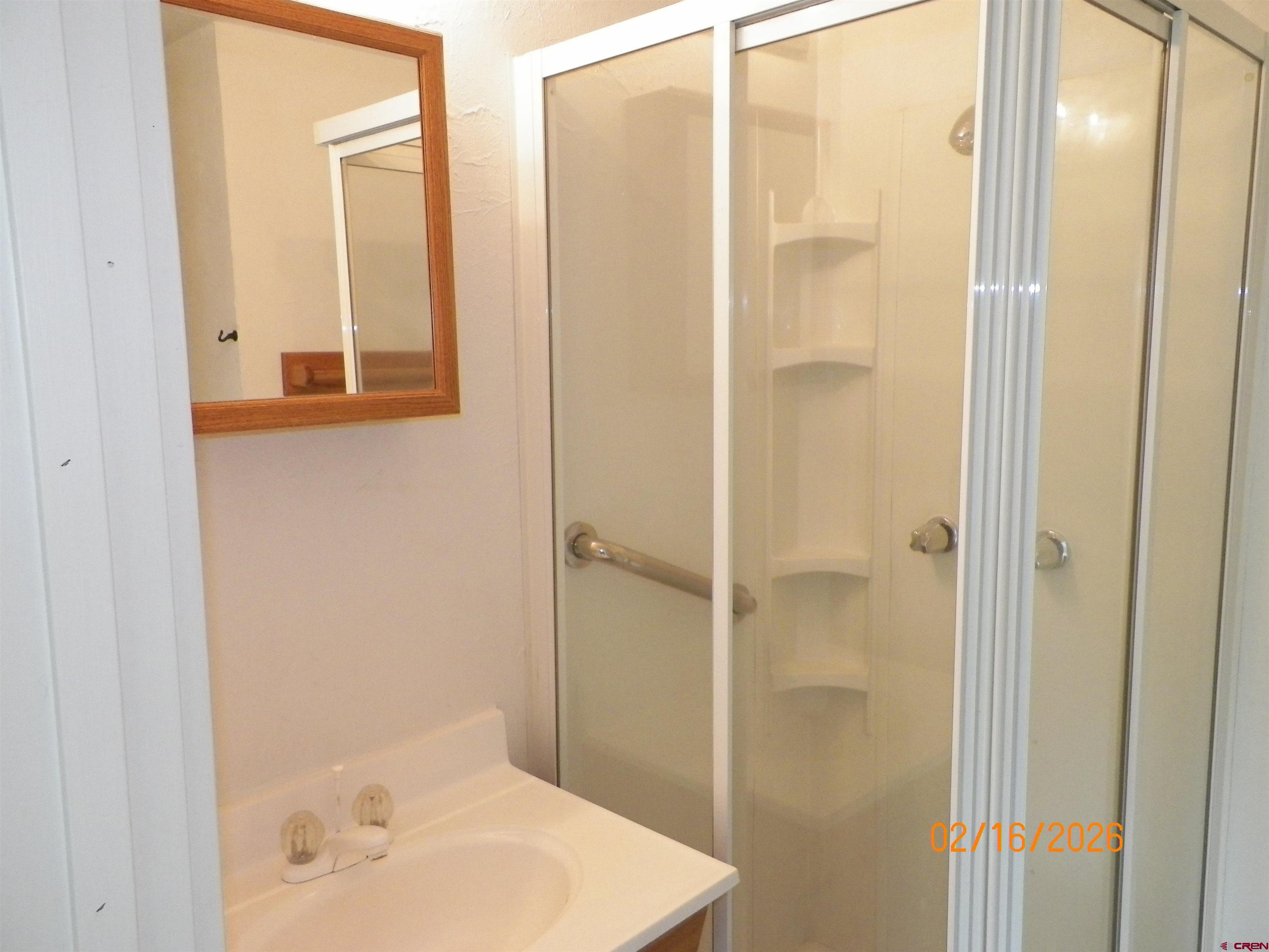 20856 2300th Road Cedaredge, CO 81413 - Photo 31 of 45 a bathroom with a shower and a sink