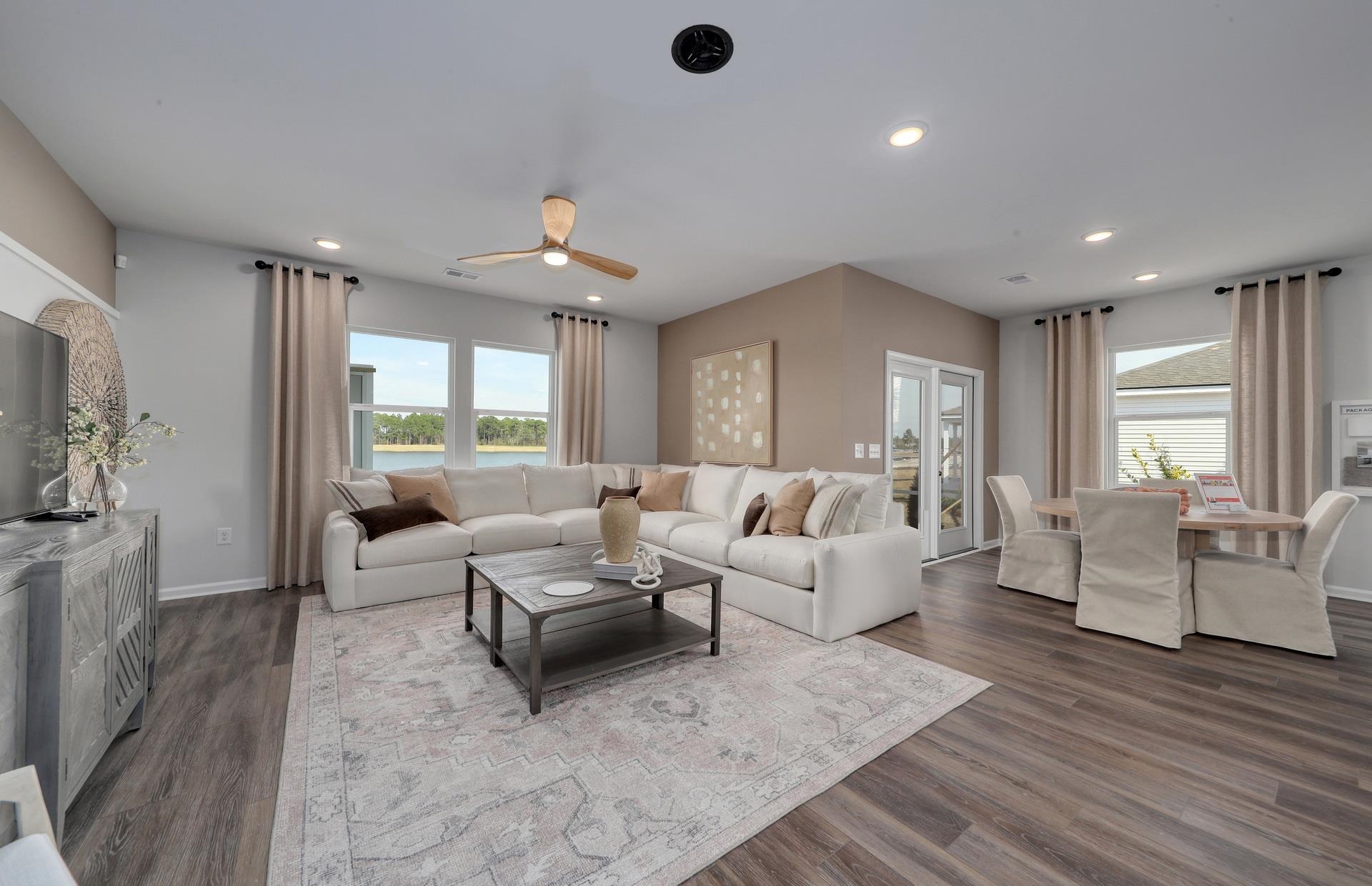 799 Laconic Drive Myrtle Beach, SC 29588 - Photo 12 of 21 Living area with ceiling fan, dark wood finished floors, a water view, and recessed lighting