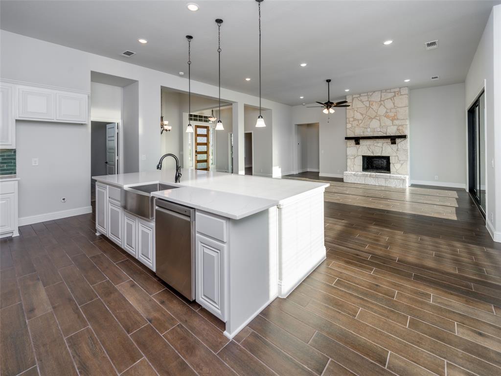 2108 Charters Circle Nevada, TX 75173 - Photo 37 of 37 Kitchen featuring ceiling fan, white cabinets, open floor plan, and recessed lighting