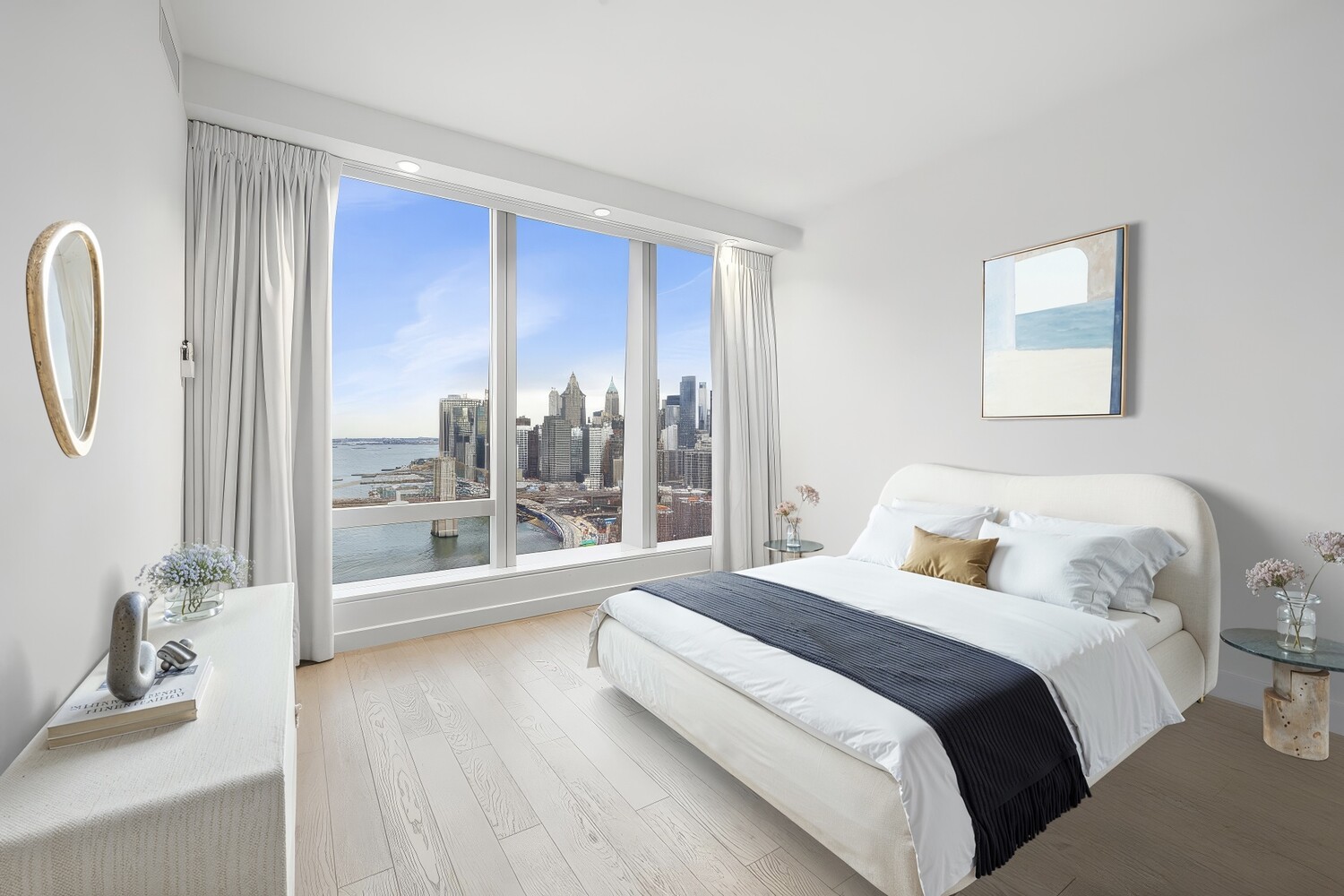 252 South Street, Unit 36C Manhattan, NY 10002 - Photo 11 of 32 a bedroom with a large bed and a large window