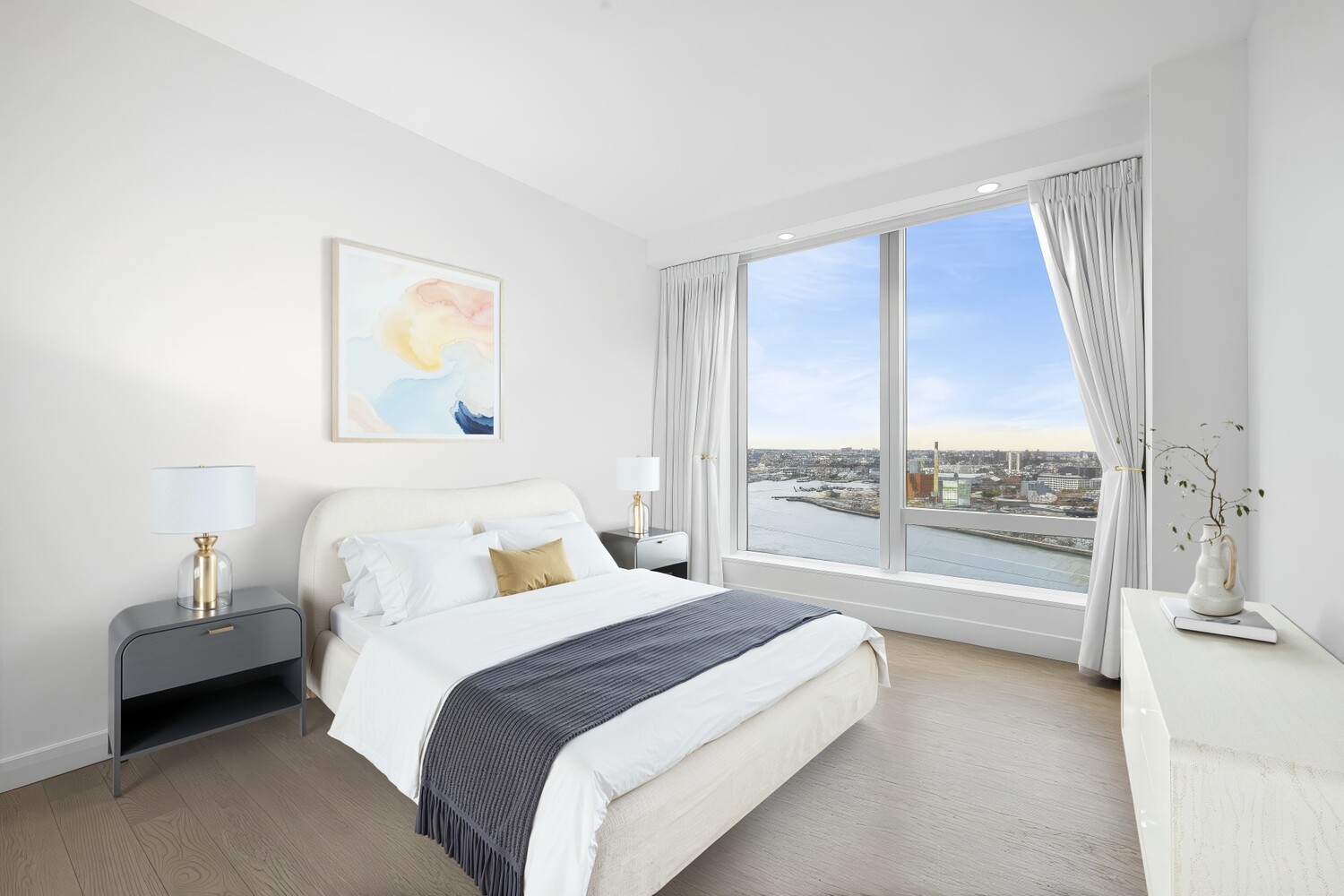 252 South Street, Unit 36C Manhattan, NY 10002 - Photo 13 of 32 a bedroom with a bed and a large window