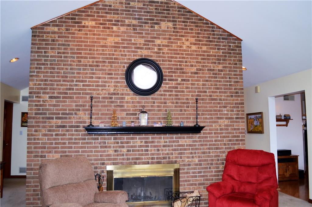 1211 East Hookstown Grade Road Clinton, PA 15026 - Photo 3 of 25 Wood burning fireplace is the feature point of this beautiful living room.