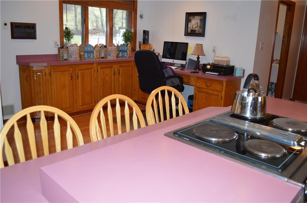 1211 East Hookstown Grade Road Clinton, PA 15026 - Photo 6 of 25 Desk area in kitchen with additional cupboards.