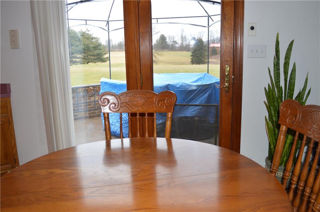 1211 East Hookstown Grade Road Clinton, PA 15026 - Photo 7 of 25 Sit in the dining room and enjoy the view or go out to the patio and enjoy nature.