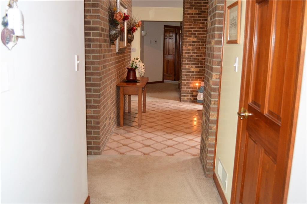 1211 East Hookstown Grade Road Clinton, PA 15026 - Photo 10 of 25 Ceramic entry way with cathedral ceilings, ceramic floors and two coat closets.