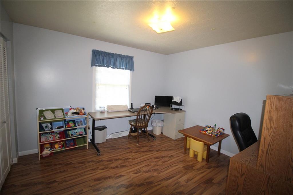 306 Sygan Road McDonald, PA 15057 - Photo 13 of 24 Third bedroom also has laminate flooring.