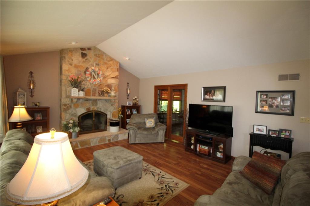 306 Sygan Road McDonald, PA 15057 - Photo 4 of 24 Another view of living room shows the glass pocket doors between dining room.