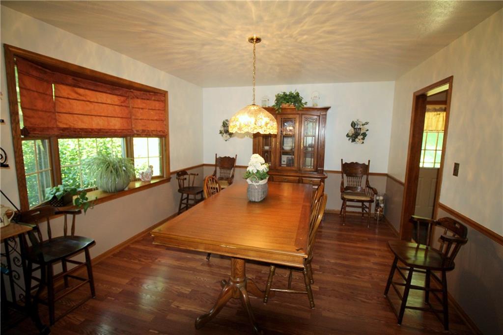 306 Sygan Road McDonald, PA 15057 - Photo 6 of 24 The spacious dining room has a bay window overlooking the side yard.