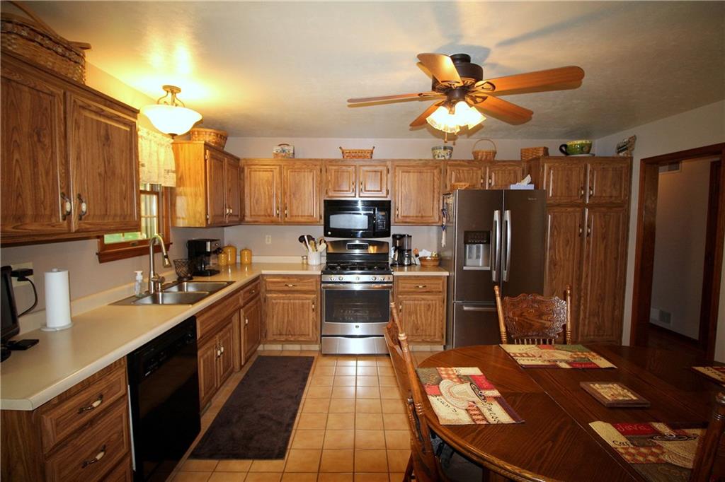306 Sygan Road McDonald, PA 15057 - Photo 7 of 24 Eat-in kitchen with ceramic tile floor. Appliances are included.