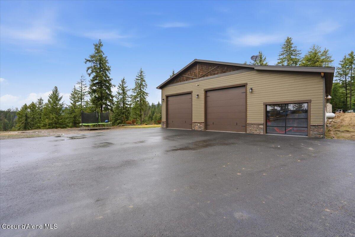 17045 West Cade Road Hauser, ID 83854 - Photo 11 of 83 11-Front of Home