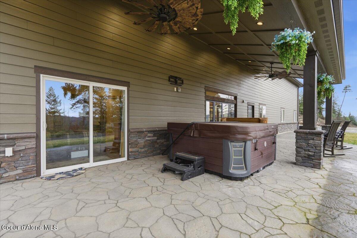 17045 West Cade Road Hauser, ID 83854 - Photo 52 of 83 52-Porch_Jacuzzi