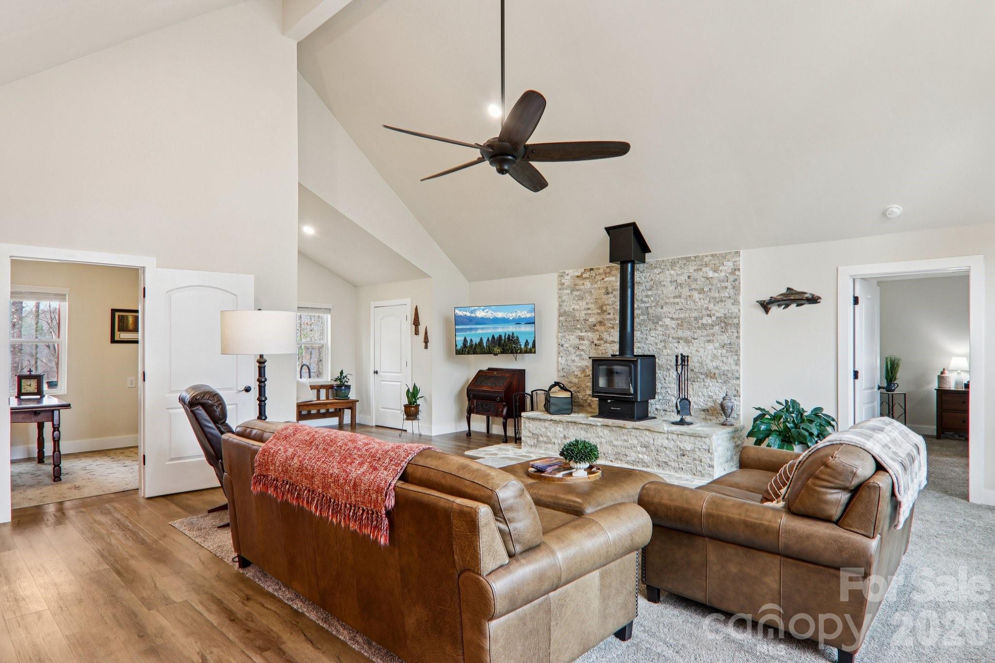 159 Broken Bow Run Pickens, SC 29671 - Photo 20 of 23 a living room with furniture a fireplace and a flat screen tv