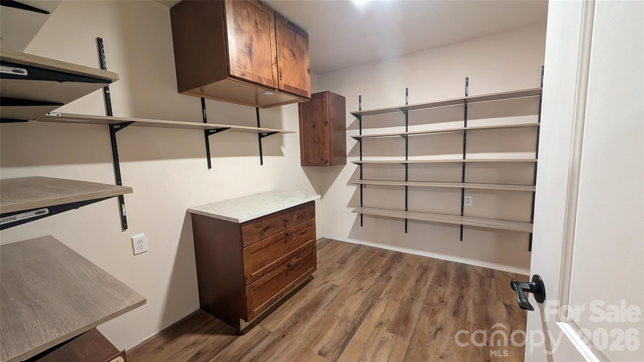 159 Broken Bow Run Pickens, SC 29671 - Photo 8 of 23 a room with cabinets and wooden floor