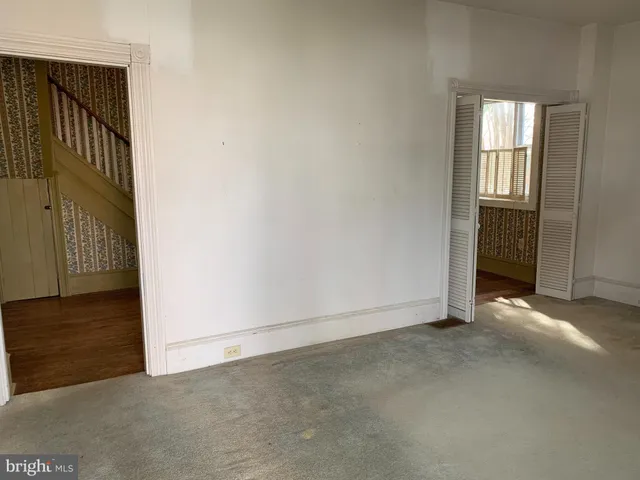 an empty room with windows