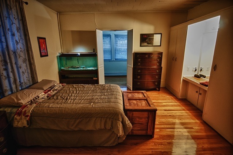 40 Beach Street, Unit 1R Bloomfield, NJ 07003 - Photo 12 of 18 a bedroom with a bed and a flat screen tv