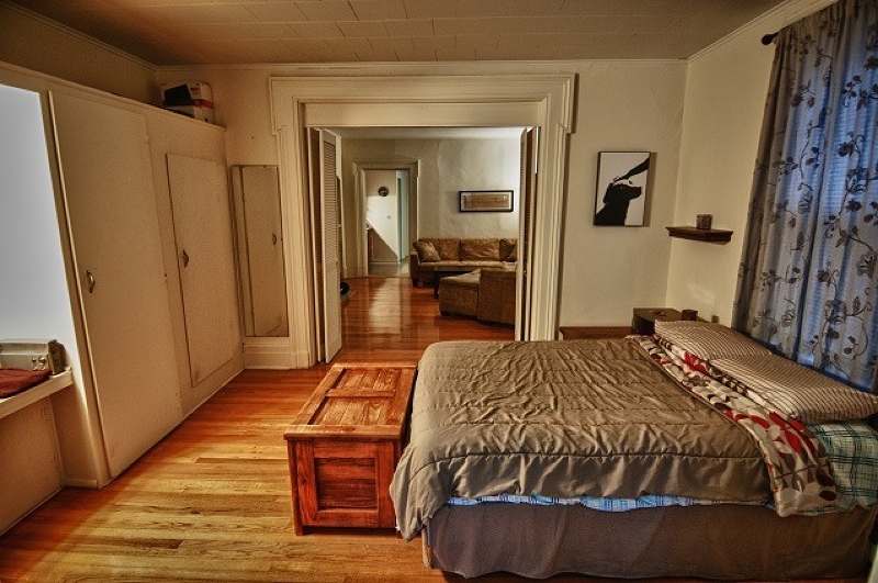 40 Beach Street, Unit 1R Bloomfield, NJ 07003 - Photo 13 of 18 a bed sitting in a bedroom next to a window