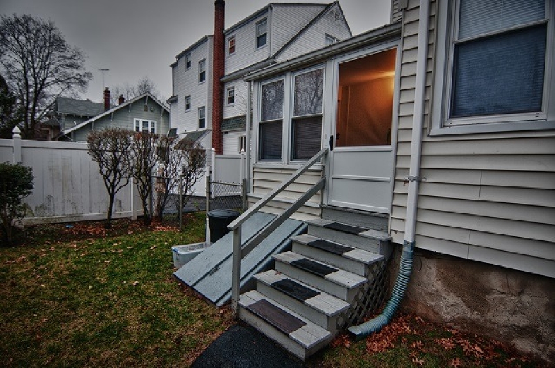 40 Beach Street, Unit 1R Bloomfield, NJ 07003 - Photo 17 of 18 a view of a house with backyard and wooden fence