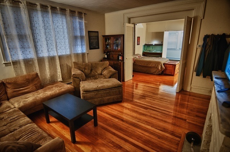 40 Beach Street, Unit 1R Bloomfield, NJ 07003 - Photo 7 of 18 a living room with furniture and a flat screen tv