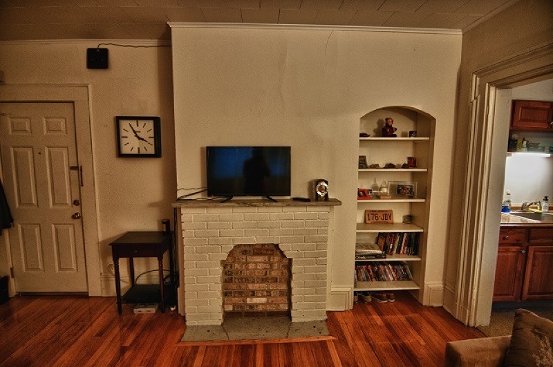 40 Beach Street, Unit 1R Bloomfield, NJ 07003 - Photo 8 of 18 a living room with furniture and a flat screen tv