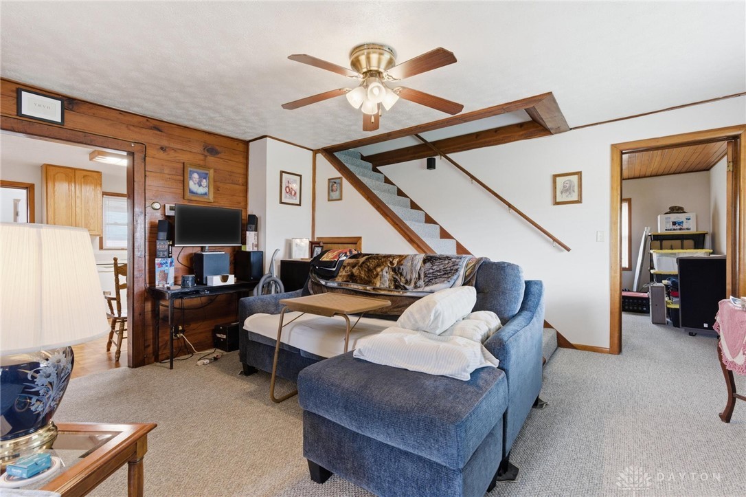 11379 Friend Road Germantown, OH 45327 - Photo 14 of 44 Warm and inviting living space with traditional wood accents and comfortable carpeting.