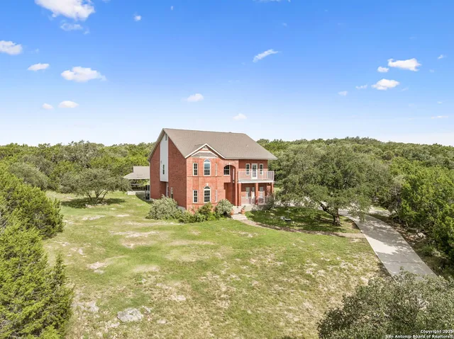 a house view with a garden space