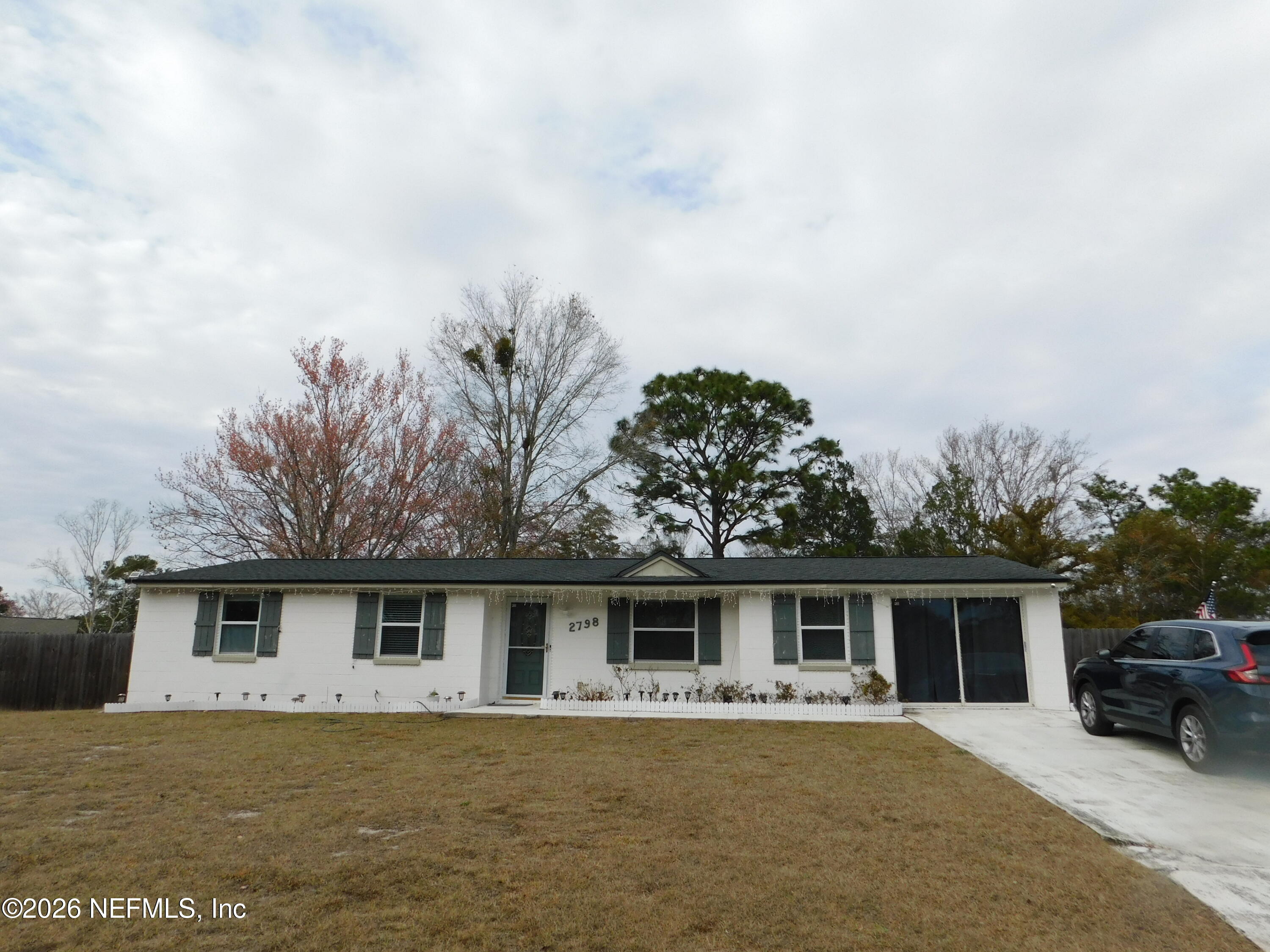 2798 Commanche Avenue Orange Park, FL 32065 - Photo 2 of 42 a house that has a tree in front of it