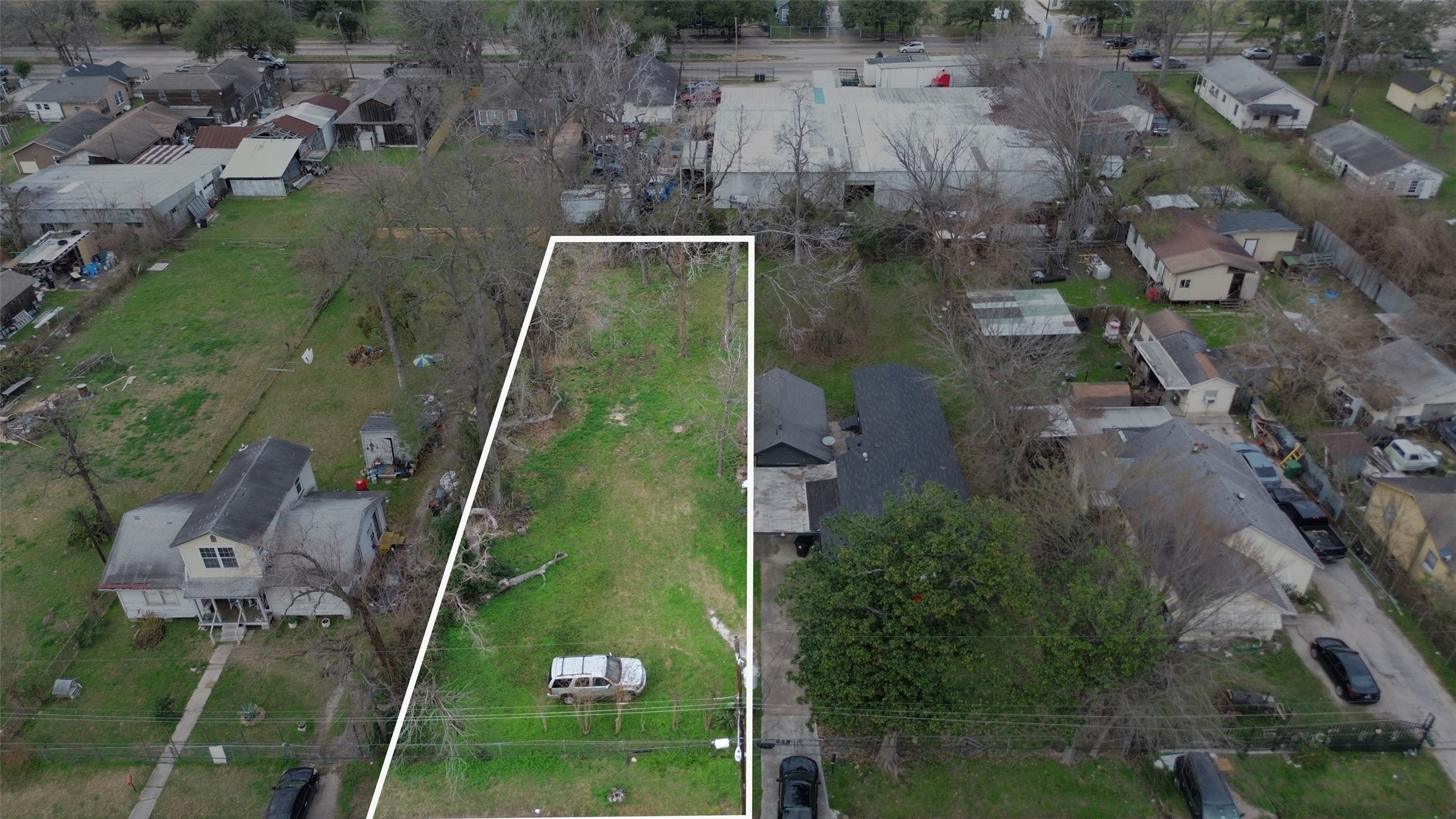 a aerial view of a house with a yard