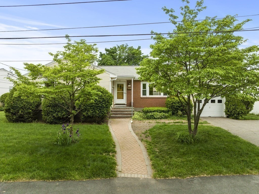 51 Albemarle Road Newton, MA 02460 - Photo 1 of 31 a front view of a house with garden