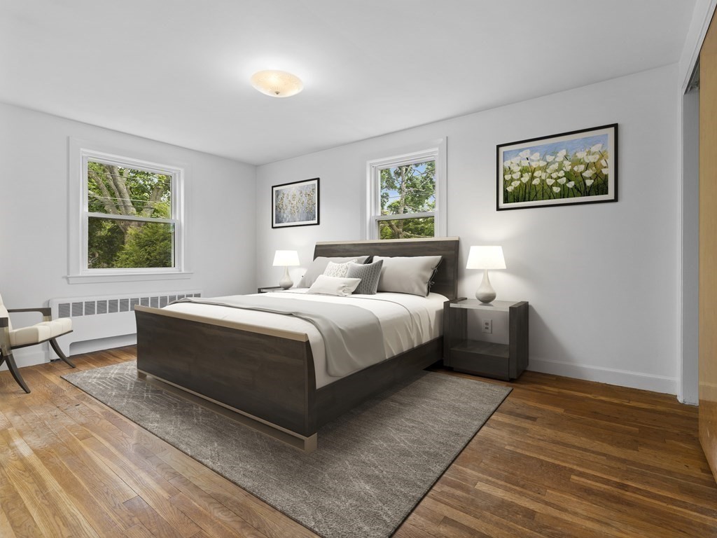 51 Albemarle Road Newton, MA 02460 - Photo 13 of 31 a bedroom with a large bed and a window